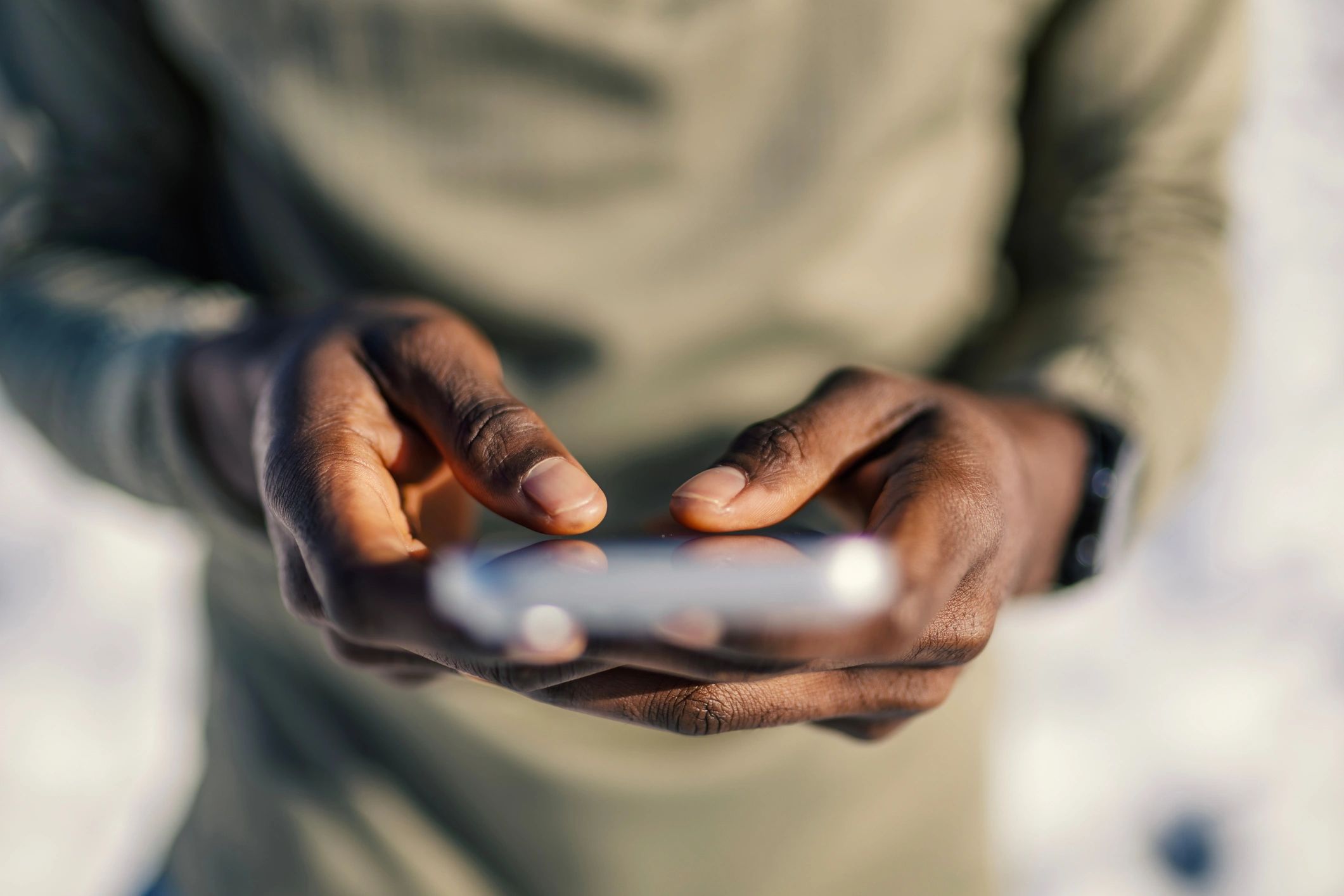 Person using a smartphone touchscreen